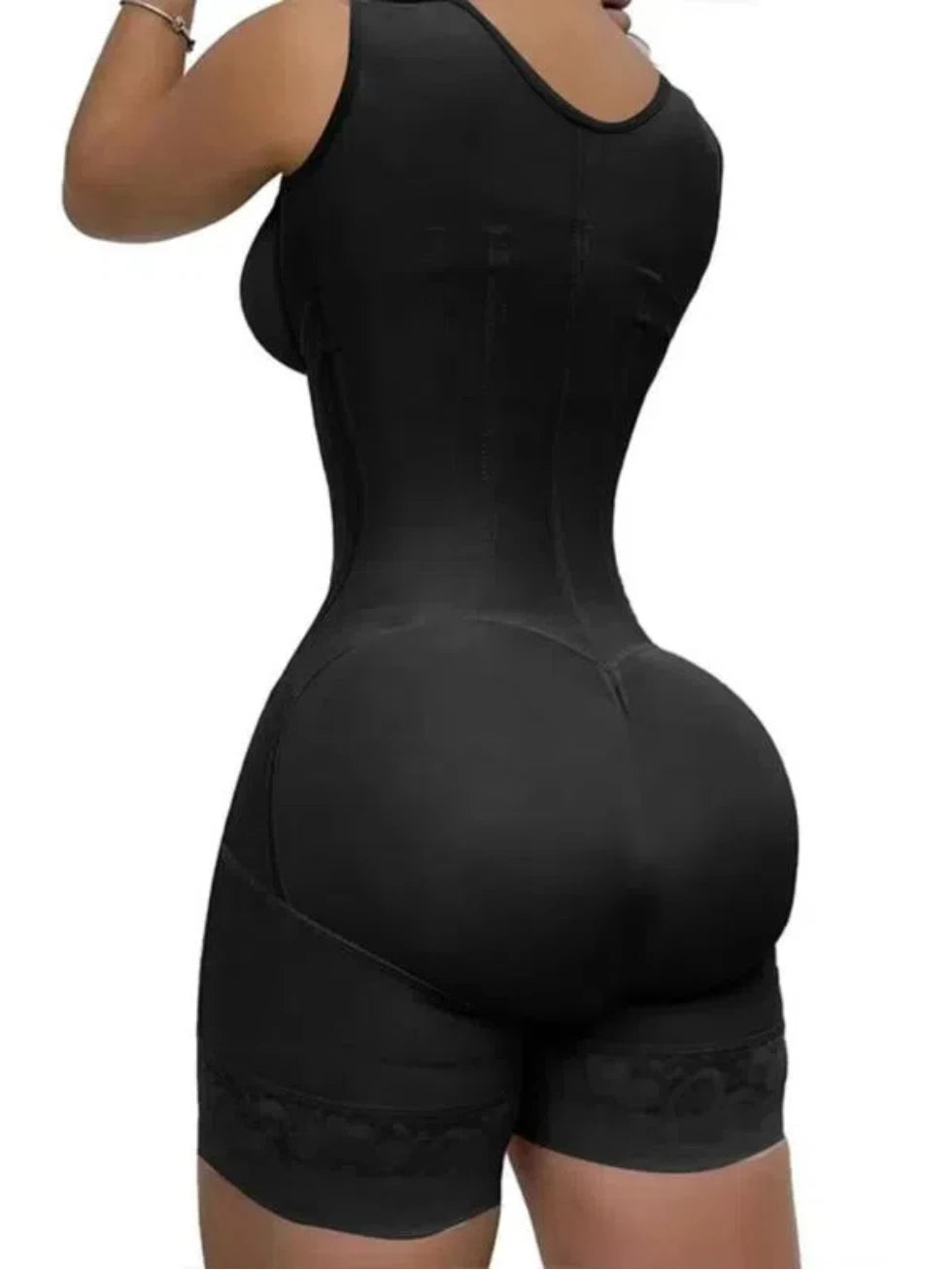 Body shaper with abdominal control, adjustable straps, and zipper.